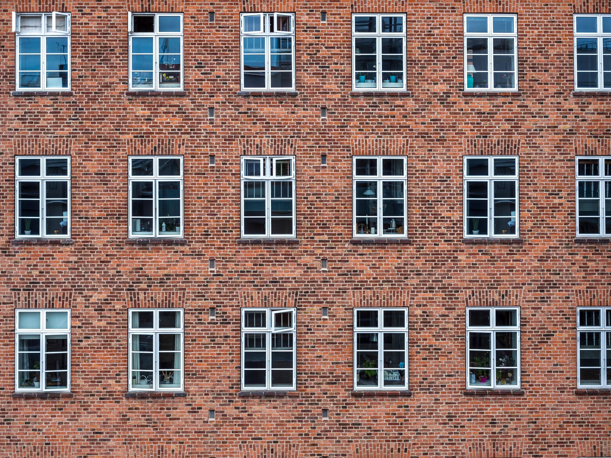 Brick building facade with multiple windows